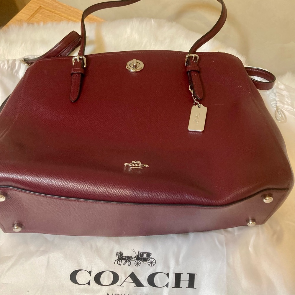 COACH Classic oxblood leather hand/shoulder/crossbody bag holds laptop.